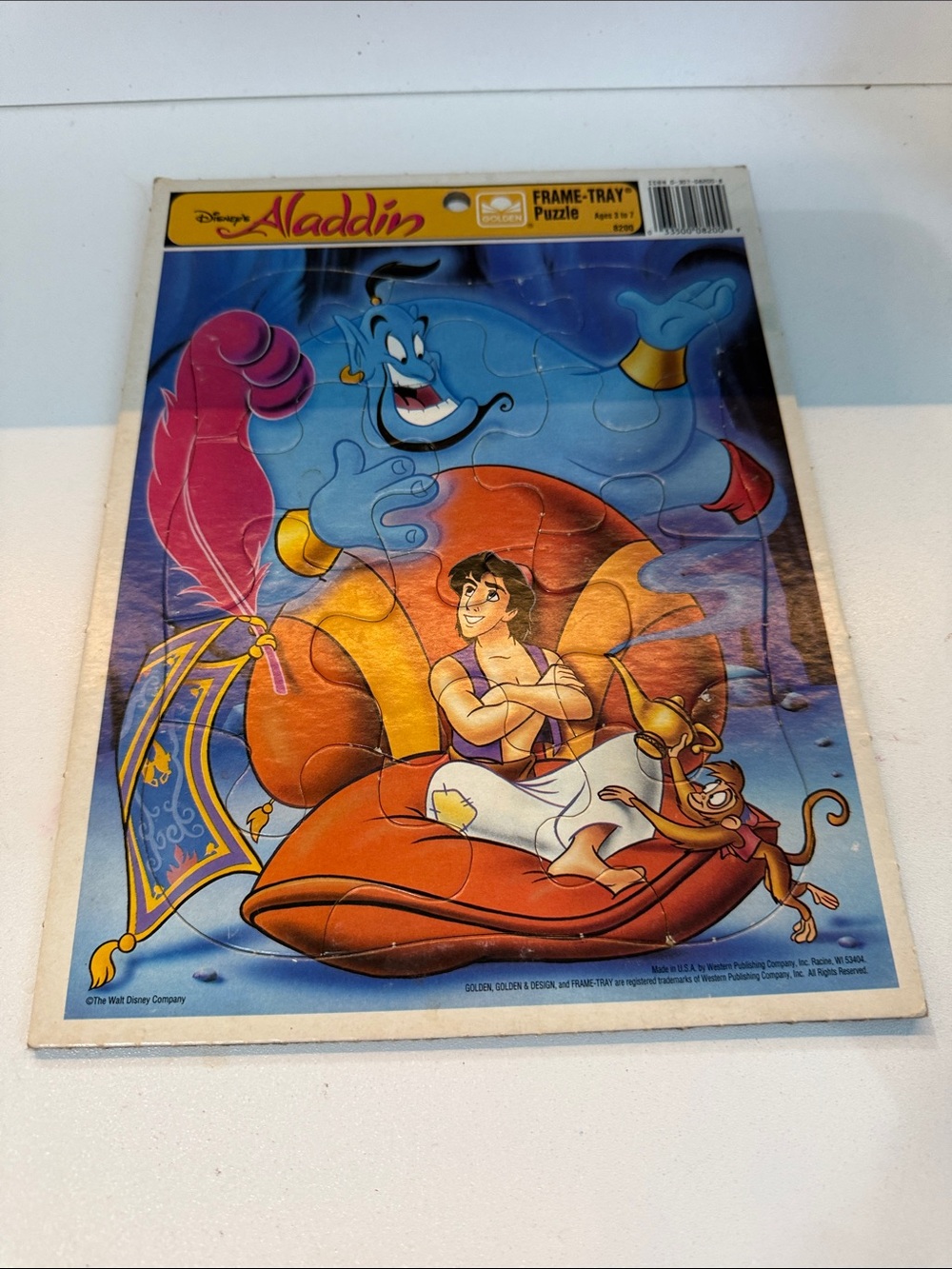 Disney Aladdin Collectible kids puzzle — Blue Genie, Orange Cushion, Red Feather